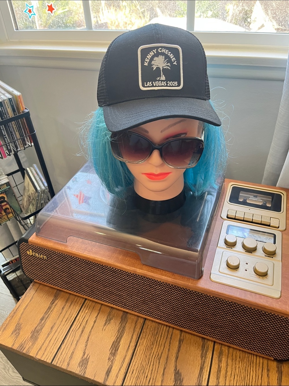 Black Mesh Trucker Hat with Bright Blue Wig Display